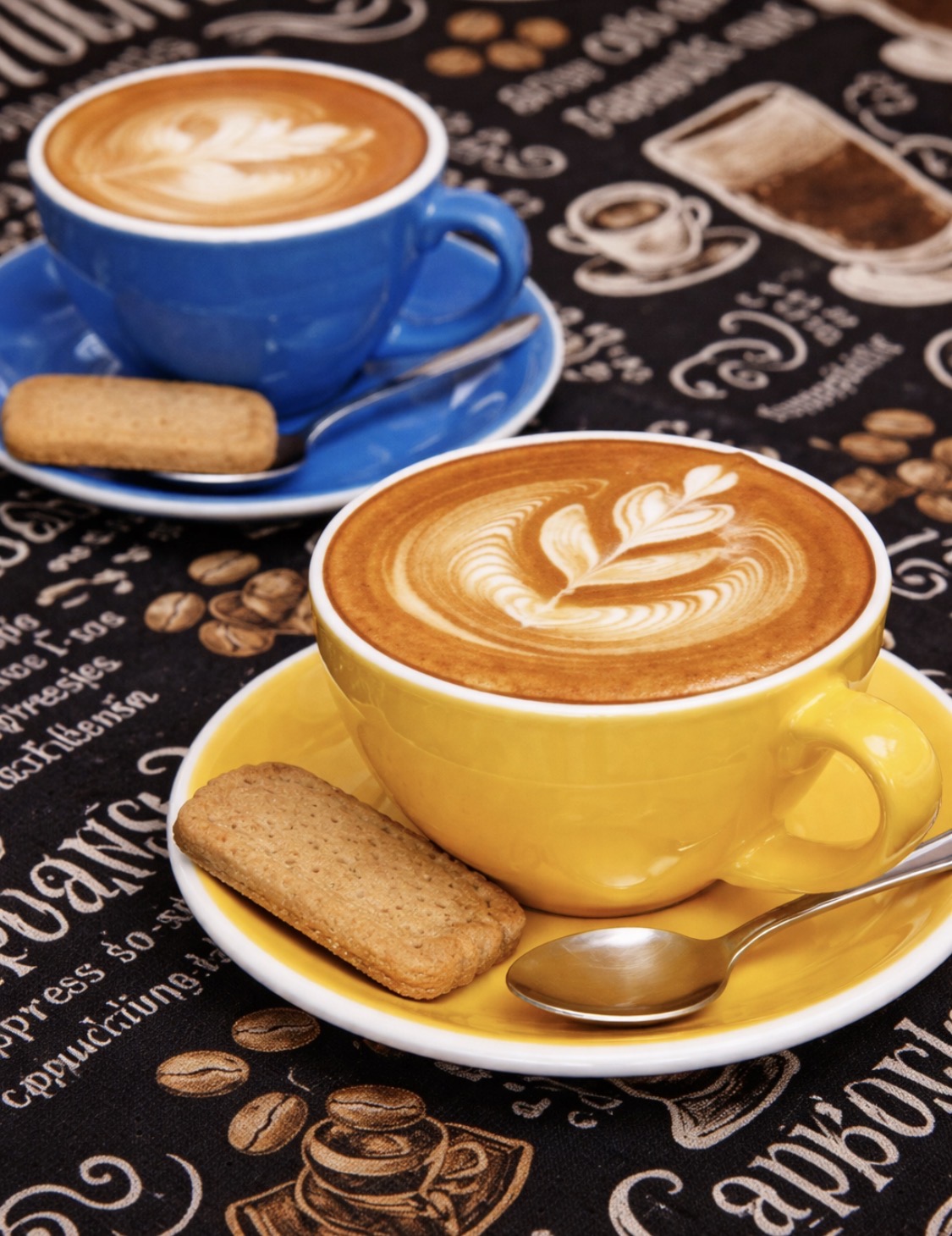 Two coffees with latte art